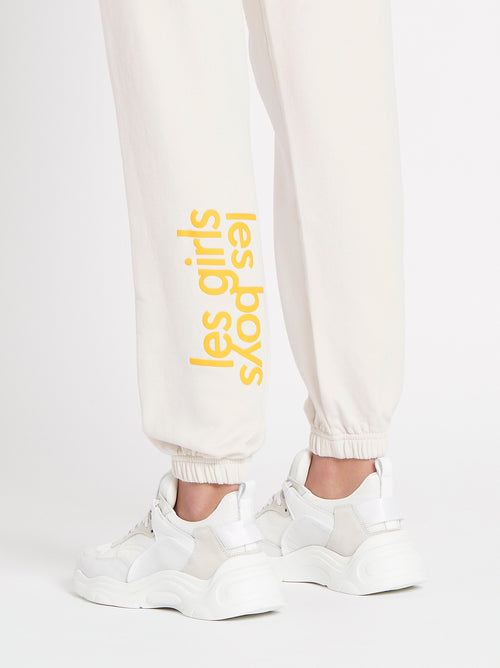 https://www.orderofstyle.com/cdn/shop/products/OrderOfStyle-LesGirlsLesBoysRegularTrackPants-VaporousGrey-05_500x.jpg?v=1675378637